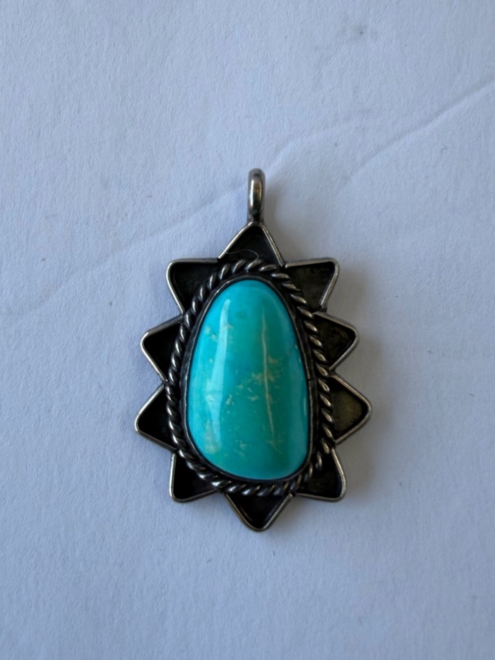 Native American sterling silver and turquoise pendant